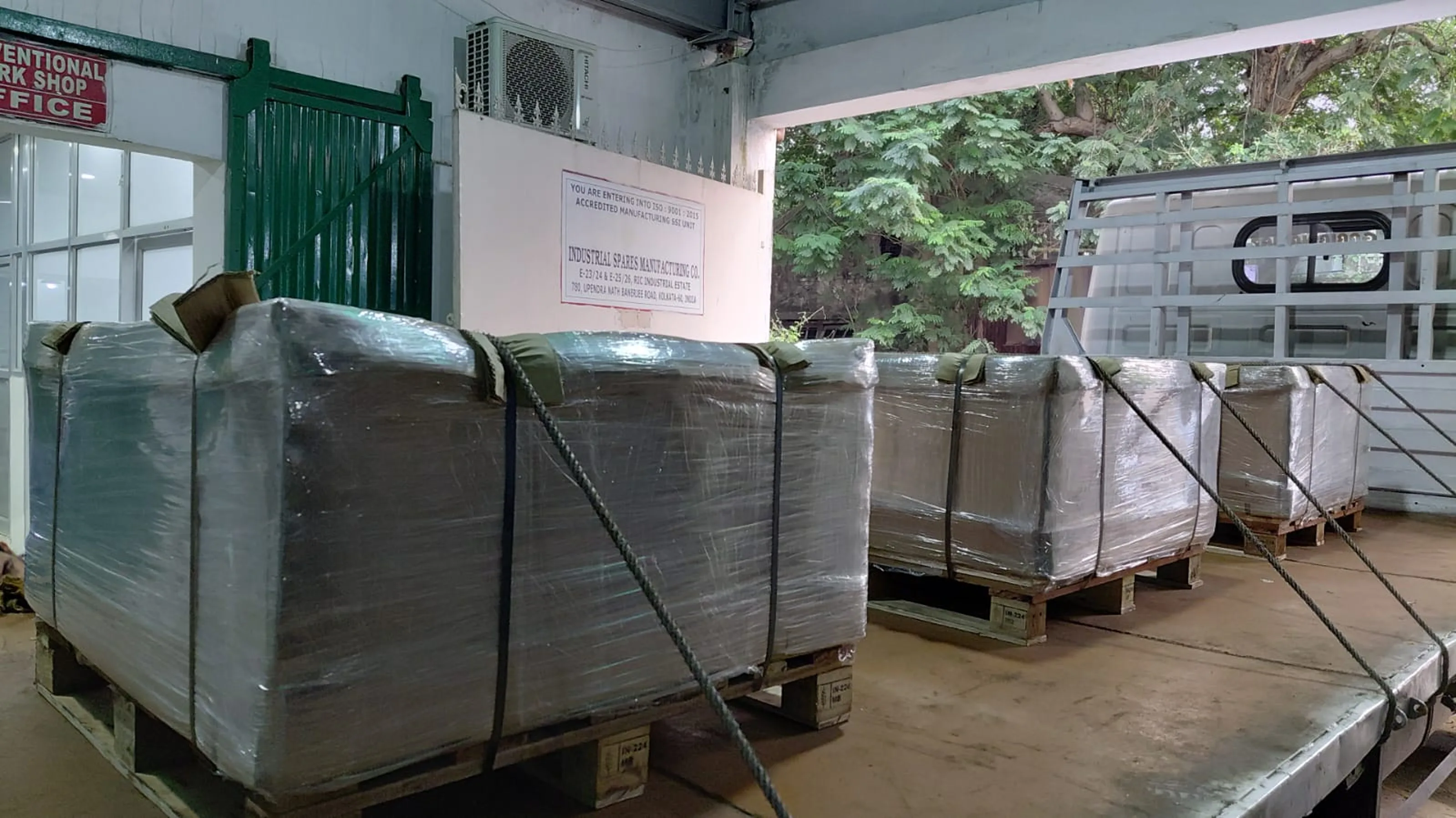 Finished goods shrink-wrapped and palletized for export at the loading bay
